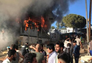 Fire breaks out inside refugee camp on Greek island, two dead