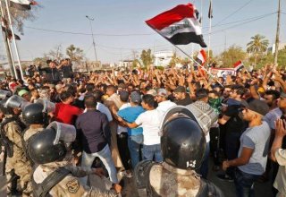 Law enforcement take control of parliament in Baghdad, protests spill into other cities