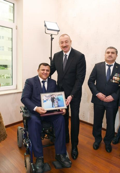 President Aliyev attends ceremony held to give out apartments to Karabakh war vets (PHOTO)
