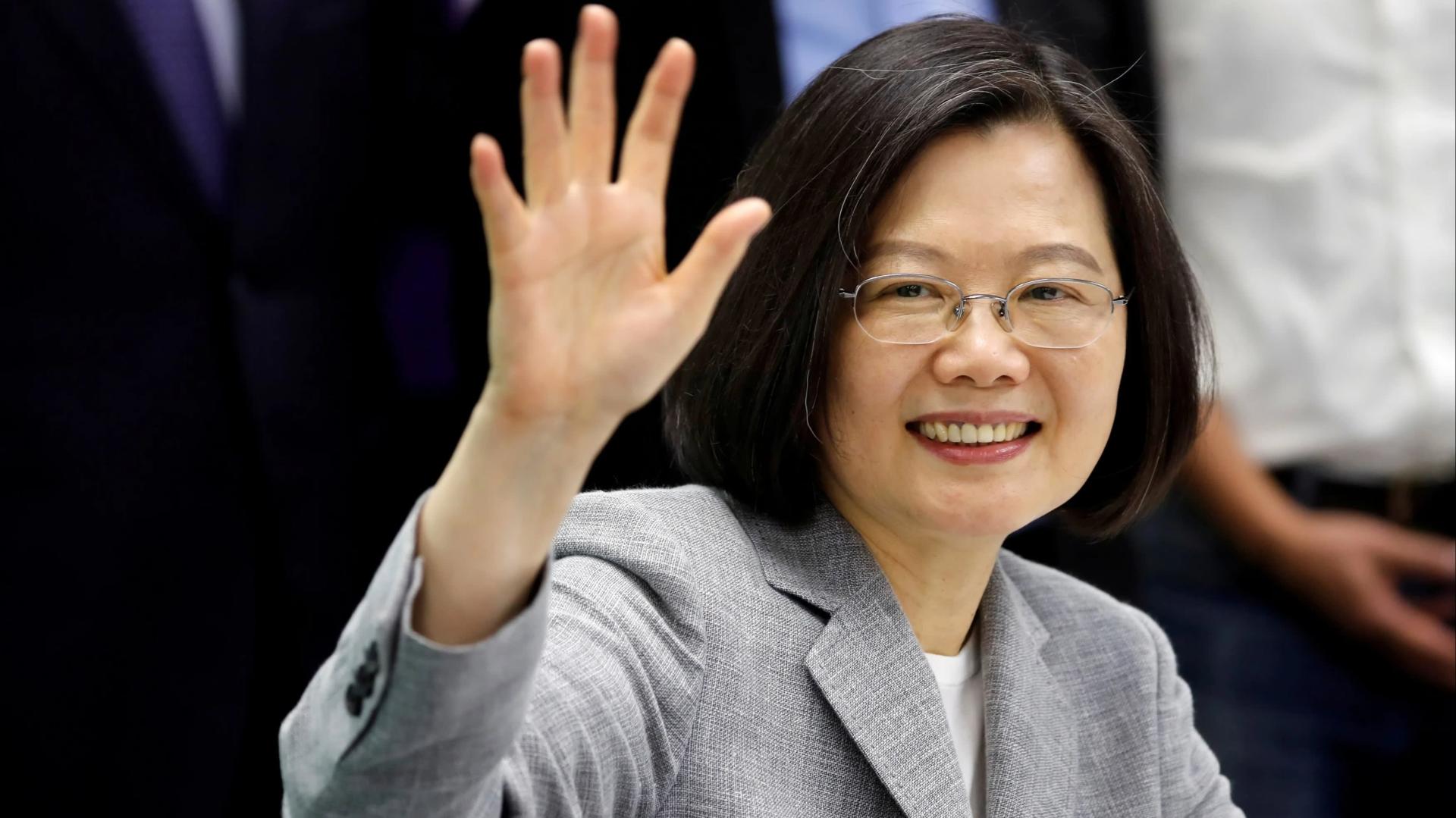 Taiwan president wins by landslide in stinging rebuke to China
