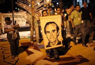 U.S. bans 13 Salvadorans over 1989 Jesuit priest killings