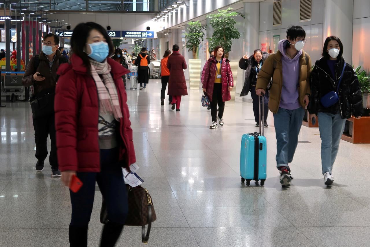 Beijing to quarantine travelers from South Korea, Japan, Iran and Italy