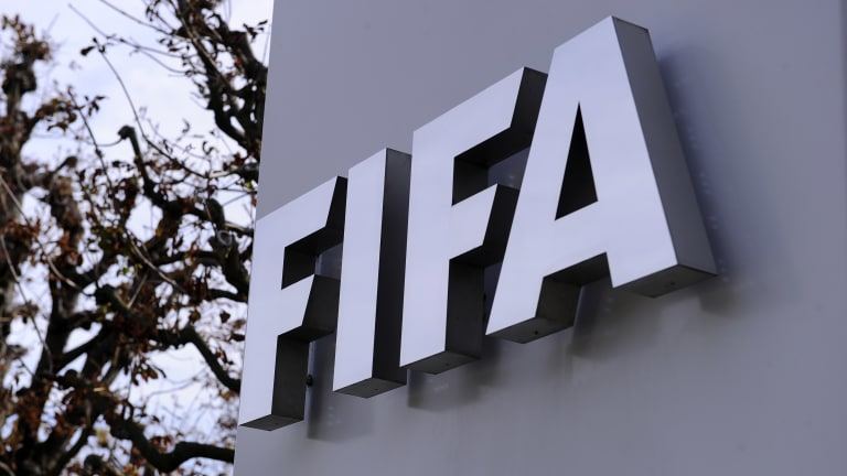 FIFA says "this is a dark day" for football after Indonesian stadium tragedy