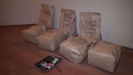Yardımlıda narkotacirlər 16 kiloqram narkotik və tapança ilə saxlanıldı (FOTO)