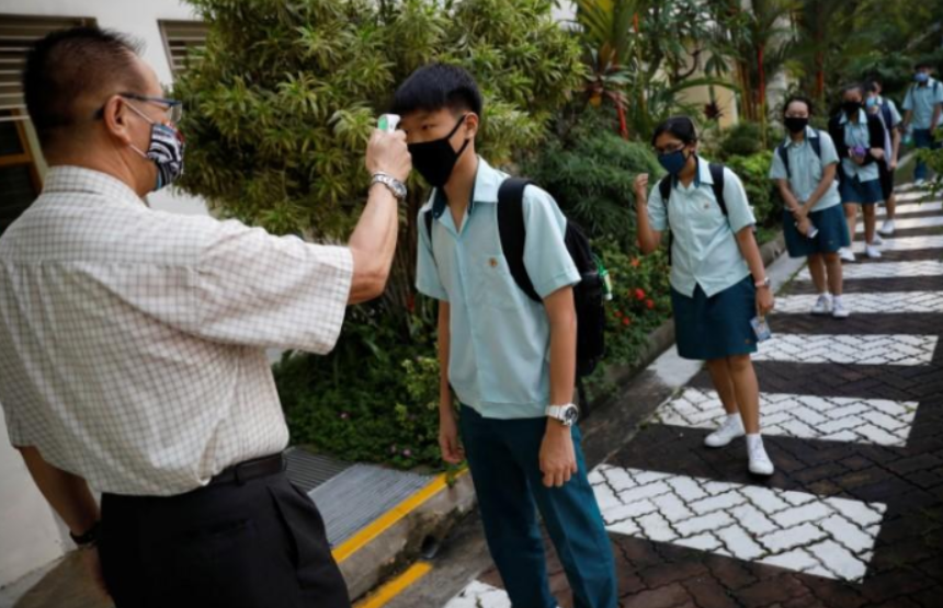 Schools reopen as Singapore eases lockdown restrictions