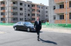 Azerbaijani president views construction of residential block built for IDPs in Samukh district (PHOTO)