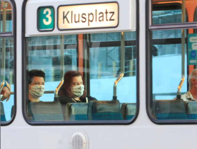 Swiss passengers don masks on trams and mountain trains to fight COVID-19