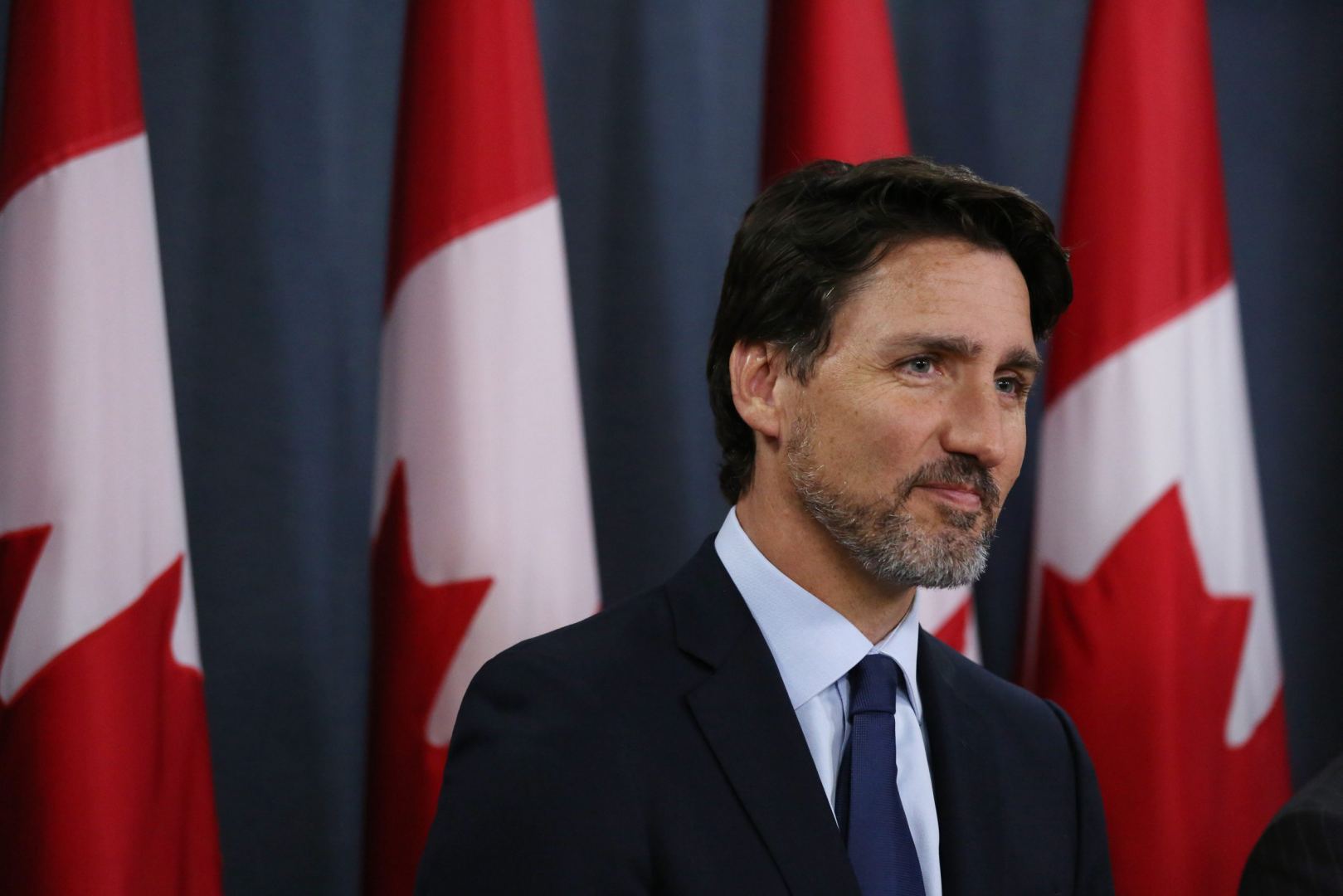 Canada's Trudeau presses Pfizer CEO on vaccine shortage, hints at travel crackdown