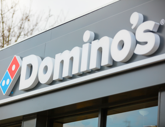 Domino's delivers upbeat results as new menu items boost sales