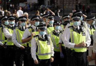 Police clash with protesters at anti-lockdown demonstration in London