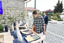 Azerbaijani president, first lady view landscaping work carried out in Balakhani settlement (PHOTO)