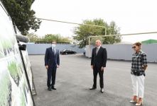 Azerbaijani president, first lady view landscaping work carried out in Balakhani settlement (PHOTO)