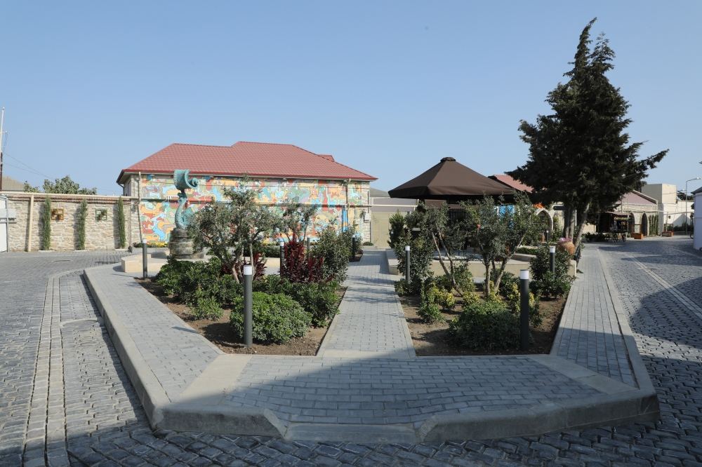 Azerbaijani president, first lady view landscaping work carried out in Balakhani settlement (PHOTO)