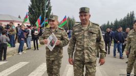 Xocavəndli məcburi köçkünlər bayraq yürüşü keçirdi (FOTO)