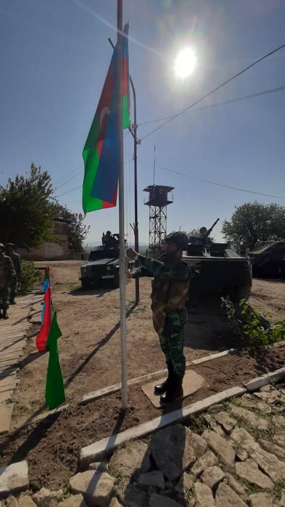 State flag of Azerbaijan raised over border outposts liberated from occupation