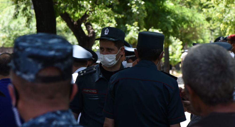 Armenian police detains people blocking entrance to military cemetery before PM's visit