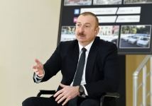 Президент Ильхам Алиев принял участие в церемонии предоставления семьям шехидов и инвалидам войны квартир в жилом комплексе в бакинском поселке Рамана (ФОТО)