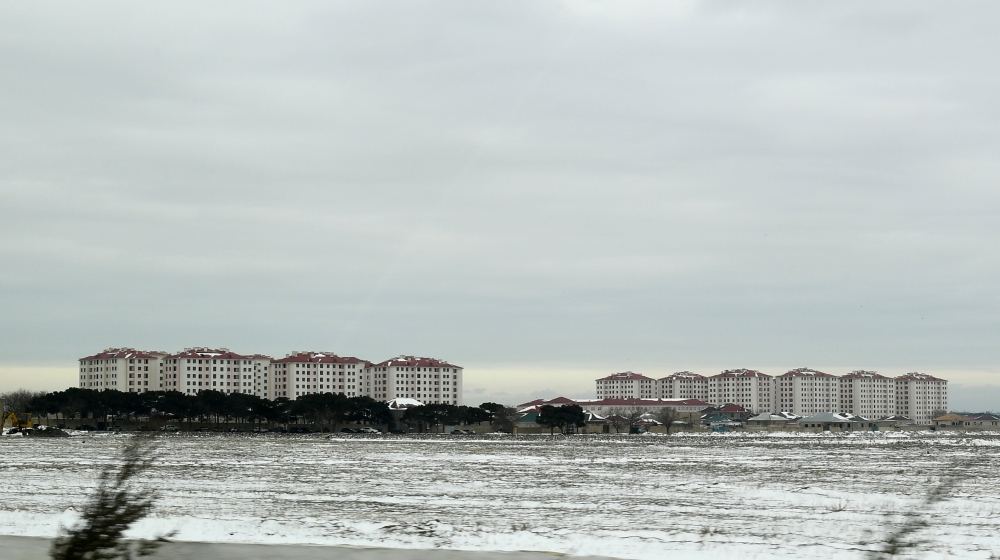 Azerbaijani president takes part in ceremony of providing families of martyrs, disabled with apartments (PHOTO)