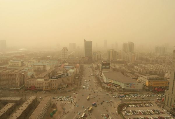Beijing choked in duststorm amid heavy northwest winds