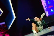 Лучшие моменты второго дня Всемирных соревнований среди возрастных групп по аэробной гимнастике в Баку (ФОТО)