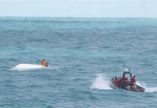 Two dead, 10 believed missing from capsized boat off Florida