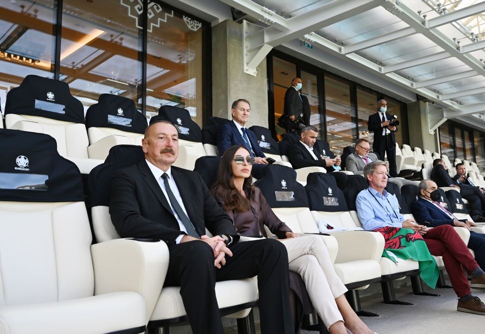 Azerbaijani president, first lady watch football match between Switzerland and Wales (PHOTO)