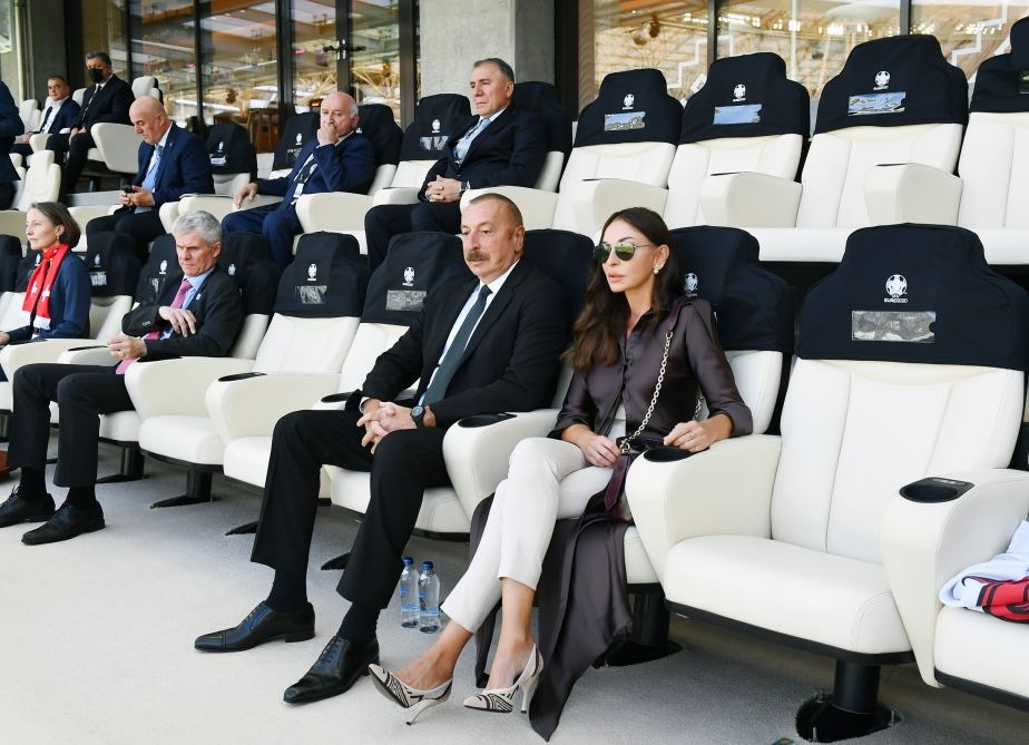 Azerbaijani president, first lady watch football match between Switzerland and Wales (PHOTO)