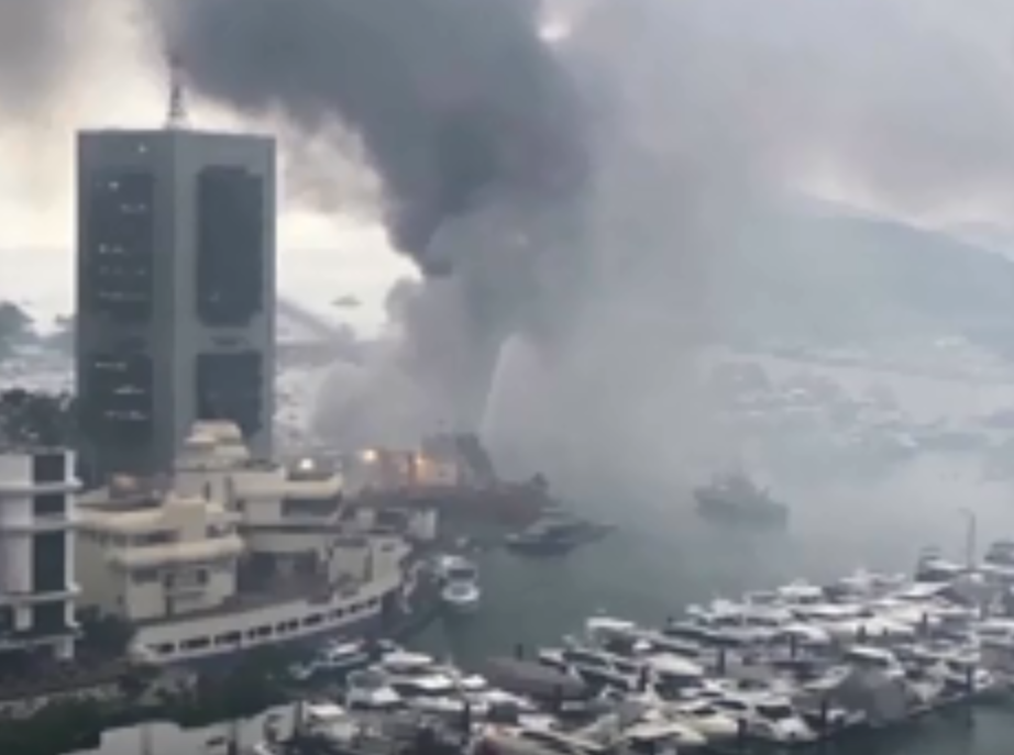 Ten cabin cruisers sink in Hong Kong marina fire