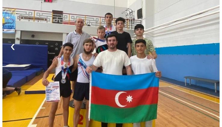 Азербайджанские гимнасты заняли призовые места на турнире по прыжкам на акробатической дорожке в России (ФОТО)