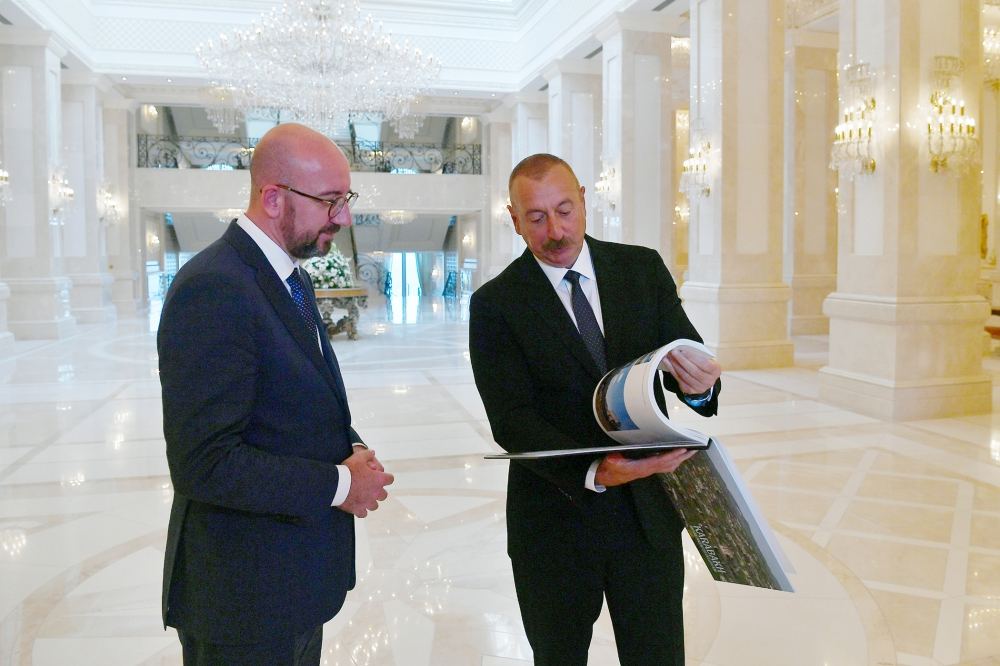 President Aliyev presents "Karabakh before and after occupation" book to Charles Michel