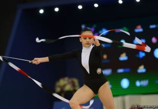 Azerbaijani gymnast performs exercise with ribbon at Tokyo Olympics