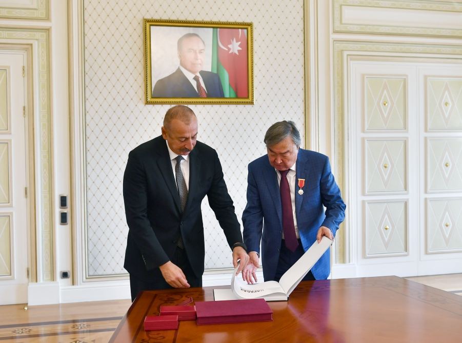 Azerbaijani president gifts 'Karabakh before and after occupation' book to famous Kazakh poet