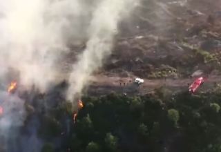 Для тушения пожара в горах Габалы задействован второй вертолет (ВИДЕО)