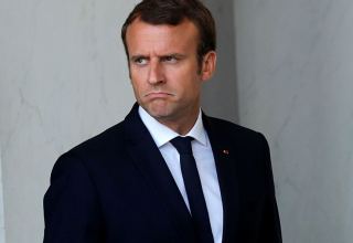 Woman to be put on trial for insulting French President Macron