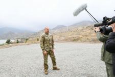 President Ilham Aliyev raises Azerbaijani flag in Sugovushan settlement, Tartar district (PHOTO)