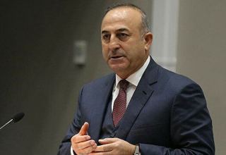 PKK images on buildings show how loose Sweden is on anti-terror fight: Turkish FM