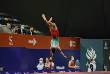 Борьба за медали - лучшие моменты третьего дня Всемирных соревнований среди возрастных групп по прыжкам на батуте и тамблингу в Баку (ФОТО) - Gallery Thumbnail