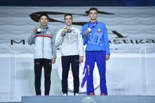 В Баку состоялась церемония награждения победителей третьего дня Всемирных соревнований среди возрастных групп по прыжкам на батуте и тамблингу (ФОТО) - Gallery Thumbnail