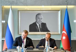 Azerbaijan, Russia’s Astrakhan sign action program to develop co-op (PHOTO)