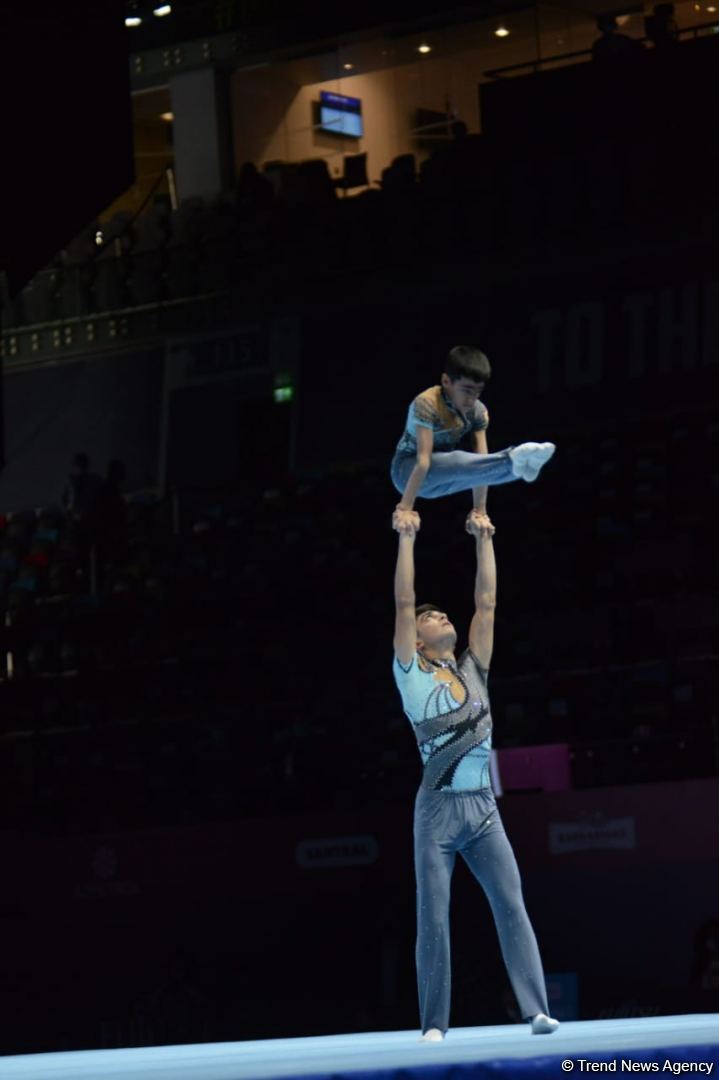 Azerbaijani athletes demonstrate balance exercises at FIG Acrobatic Gymnastics World Age Group Competitions in Baku (PHOTO)