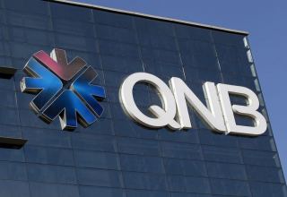Gulf lender QNB's quarterly profit climbs 9% on loan growth