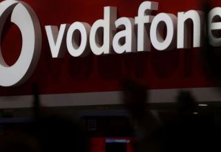 Vodafone shares edge up after UAE stake buy provides support