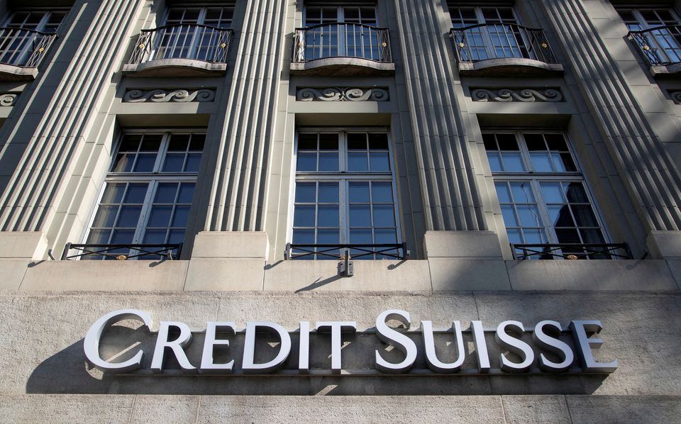 Credit Suisse five-year credit default swaps fall after debt buyback plan