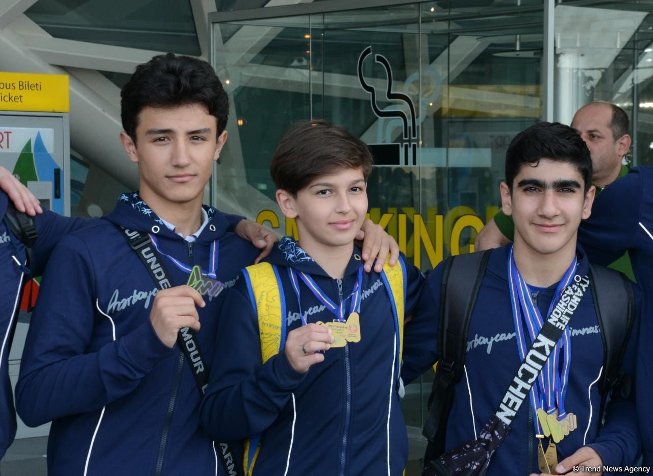 Азербайджанские гимнасты привезли в Баку из Италии медали Чемпионата Европы (ФОТО)