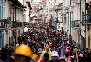 Thousands march in Quito after night of Ecuador protest violence