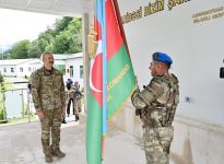 President Ilham Aliyev hands over battle flag to commando military unit in Kalbajar district (PHOTO)