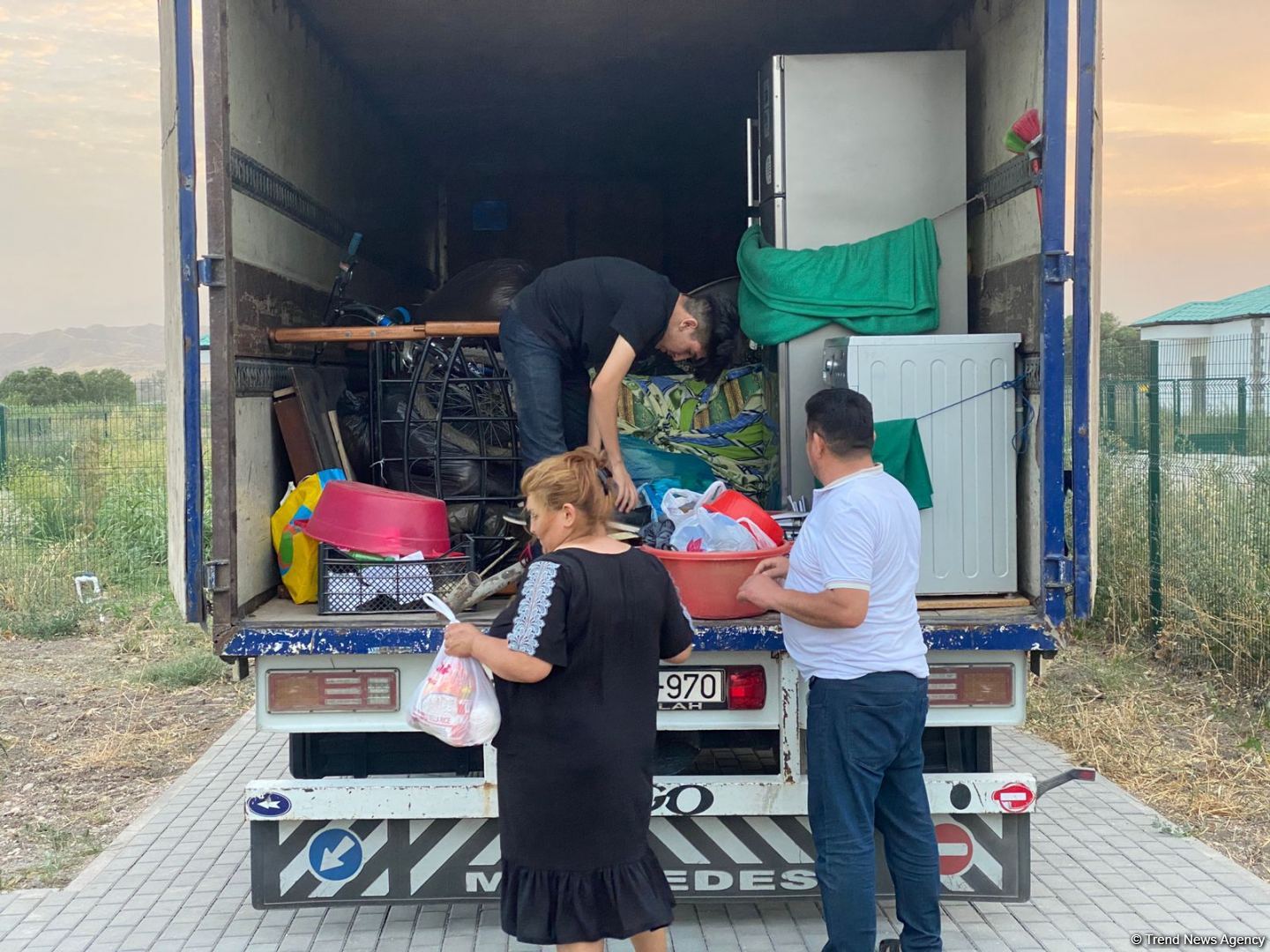 Residents of Azerbaijani Aghali village receive keys to their houses (PHOTO)