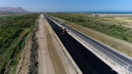 Bakıdan Rusiya ilə sərhədədək uzanan yolun yatağı və yol əsası inşa edilir (FOTO/VİDEO)
