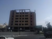 В одном из районов Баку сносится многоэтажное здание (ФОТО)