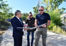 President Ilham Aliyev and First Lady Mehriban Aliyeva inquire about restoration work in administrative building of Shusha apartment utility and maintenance service (PHOTO/VIDEO)